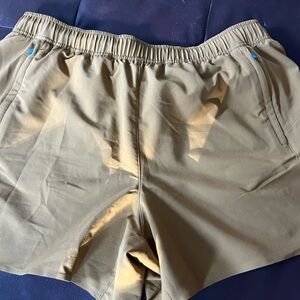 Janji women’s Medium running short. New without tags. Rust color.
